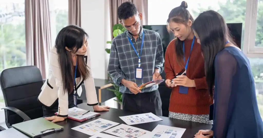 public policy professionals reviewing reports in a formal office setting